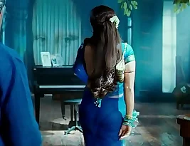 The sexy Rani Mukherjee wears a translucent saree that shows her panties and curves of her ass.