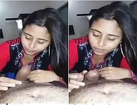Special sex appeal of an Indian woman while giving blow job to her loved one.