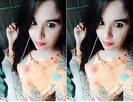 Young Indian woman flashing her breasts to her lover.