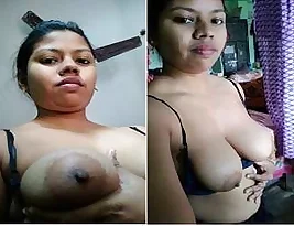 Hot Indian housewife showing off her large breasts and twisting wet Lubricious pussy.