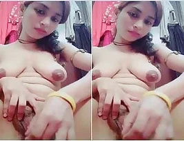 Beautiful Indian woman posing naked and pleasuring herself for her lover.