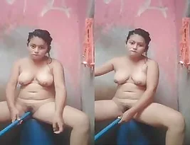 Hot bathing scene with an Indian beauty, alone and enjoying herself.