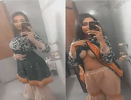 Porn featuring a college girl stripping and seducing her boyfriend.