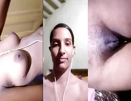 A beautiful college student showing off her body in a cam selfie video.