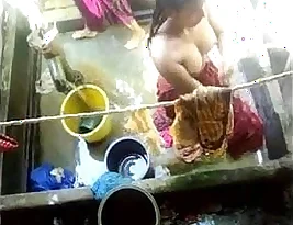 Bangladesi housewives washing themselves in a forest (5)