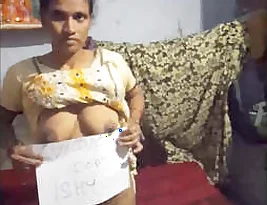 A married woman from a rural area exposes her breasts and vagina.
