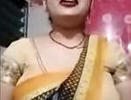 A chubby older woman undresses for her partner.