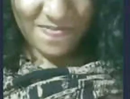 A stunning curly-haired beauty exhibits pretty facial expressions and shares leaked videos of her big beautiful breasts.