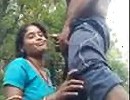A couple in Odia enjoys oral sex outside.