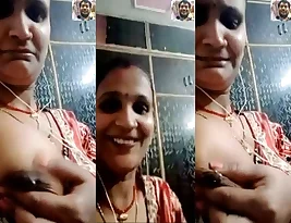 Steamy video of Indian housewife teasing with her breasts.