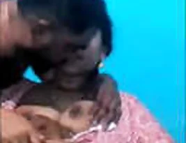 A lucky guy is able to touch the breasts of a Indian house wife.