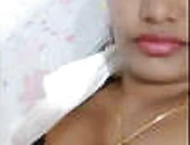 Beautiful Indian woman showing her breasts during a video call.