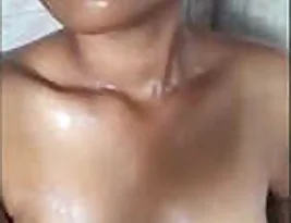 Small clips of a beautiful Indian girl during a bath.