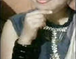 A beautiful Indian woman exposing her breasts and having sex in a number of scenes.
