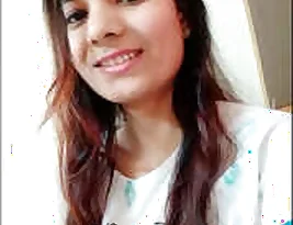 Sweet Indian baby playing adult games.