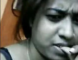 A shy Indian woman reveals her breasts in a video call