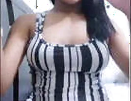 A beautiful Indian woman displaying her beauty in a live webcam performance.