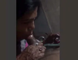 Cheating wife on phone while giving a blowjob to her boyfriend.