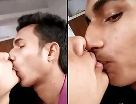 A beautiful woman receives kisses from a close friend.