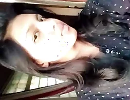 A teenage webcam model performing for her boyfriend.