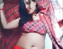 Steamy Indian wife wears a yellow dress to dance.