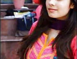 Hot Indian babe strips and reveals her charms.
