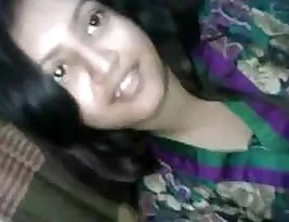 Pretty Indian girl undressing for her boyfriend who is filming her.