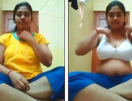 Selfie of a college girl with big boobs and a happy boyfriend.