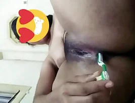 Toothbrush licking in an Indian orgasm video