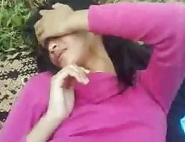 Outdoor college revelry turns into a young woman giving blow job and having sex on a grassy knoll.