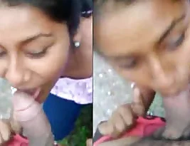 A college girl from Nagpur called Munni gives a blow job to a guy older than her in the open.