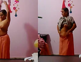Aunt changes her dress in a rather provocative manner.