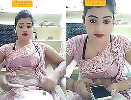 Beautiful girl with a great shape of the body wears a transparent pink saree and you must not miss her.