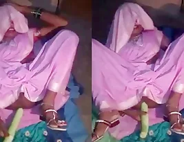 Hot Indian bhabhi tries to fit the longest cucumber into her vagina