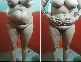 Amateur video of a HOUSEWIFE giving a solo performance while washing dishes.