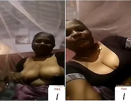 Exclusive video of a naughty auntie flashing her tits to her lover