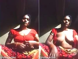 A hot Indian wife showing her breasts and vagina