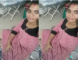 Amateur video of an Indian bhabhi showing her boobs and pussy