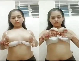 Cute girl from Bangladesh tweaking her boobs in this exclusive porn film.