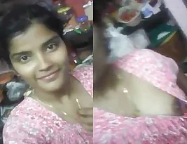 A beautiful Indian girl continues to reveal her charms to her lover.