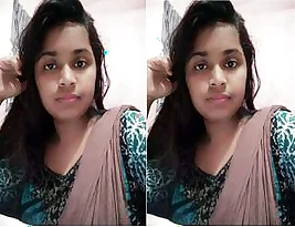 Amateur video of a desi girl who likes to pleases herself by rubbing her big boobs.