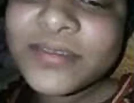 A beautiful Asian woman masturbates using her fingers.