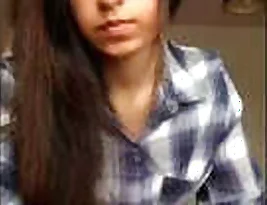 A sexy woman masturbates with a sex toy and then sucks on her own cum.