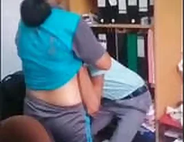 Office scene with an Indian aunt-like character seductively sucking boobs