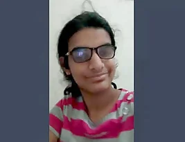 An Indian girl shows her body in four different positions in four different clips.