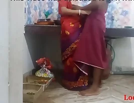 Hot kitchen scene with a beautiful bhabi in red saree
