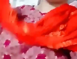 A sweet girl in making an video