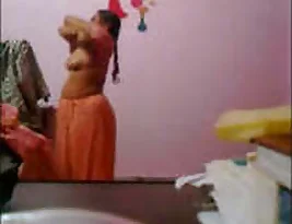 Private video of a mature bhabhi in saree removal.